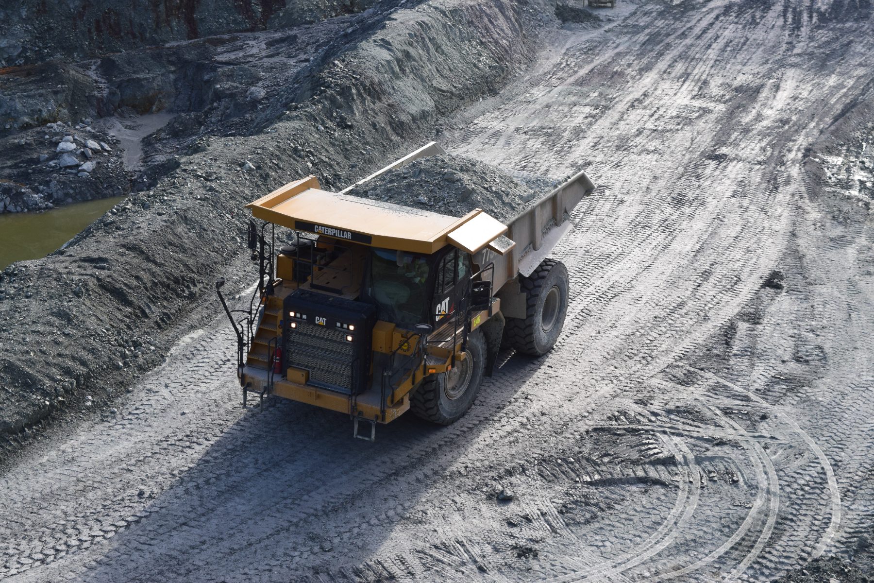 Haul truck on quarry bench